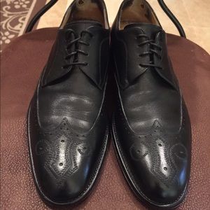 J&M Italian calf skin wing tip dress shoes.